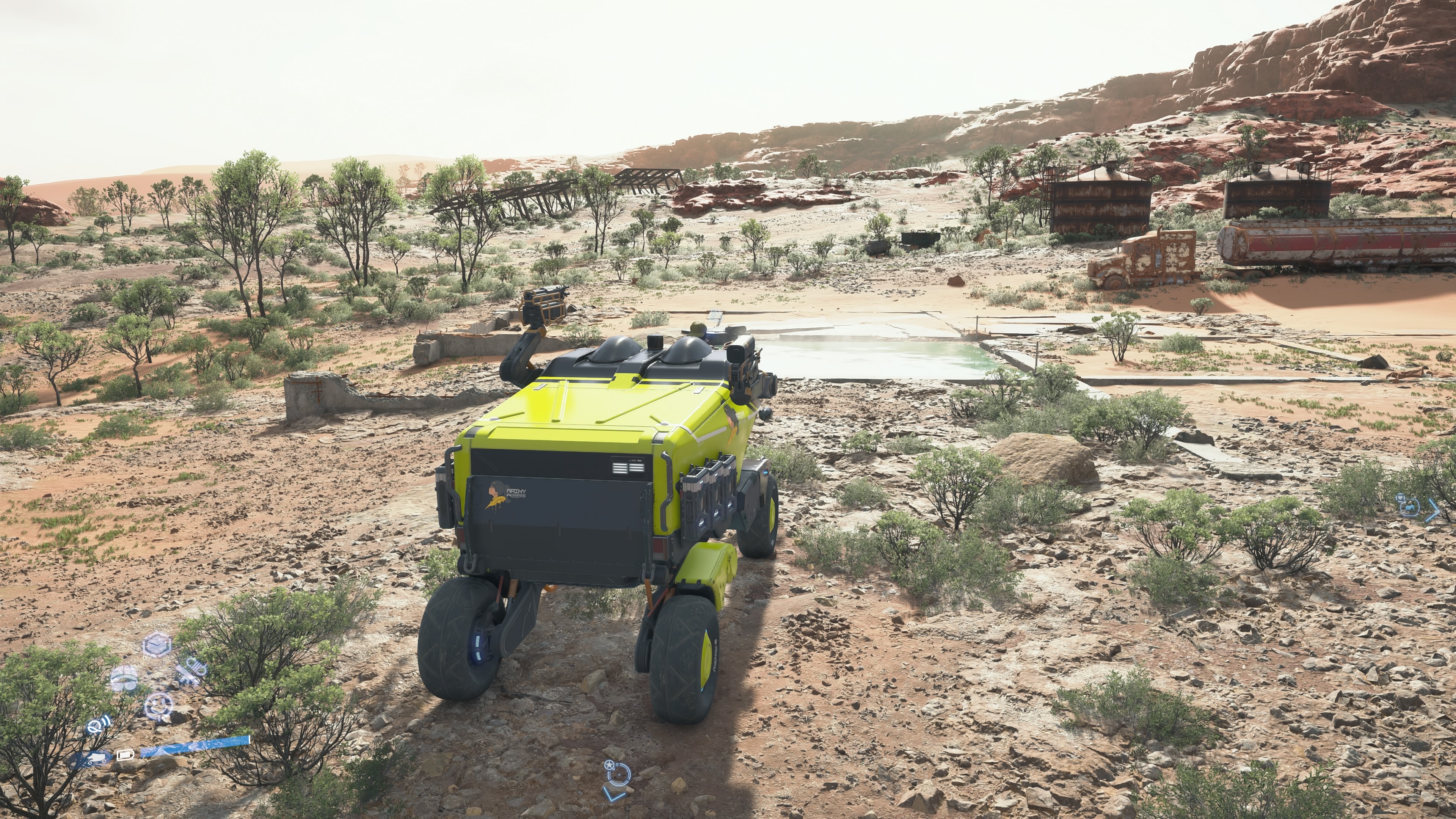 Death Stranding 2 carry capacity: Driving a Pickup Offroader through a desert.