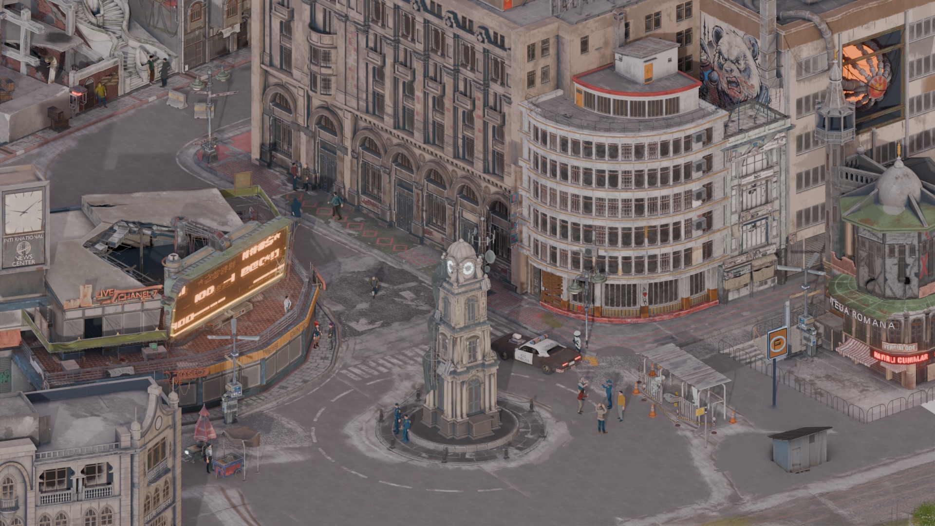 Overhead shot of a town square, with a clock tower in the centre.