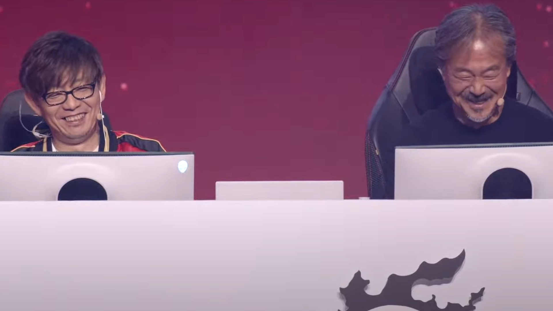 Naoki Yoshida, director of Final Fantasy XIV, and the creator of Final Fantasy franchise Hironobu Sakaguchi sit on stage at the game's 2023 London Fanfest, laughing at their past tomfoolery.