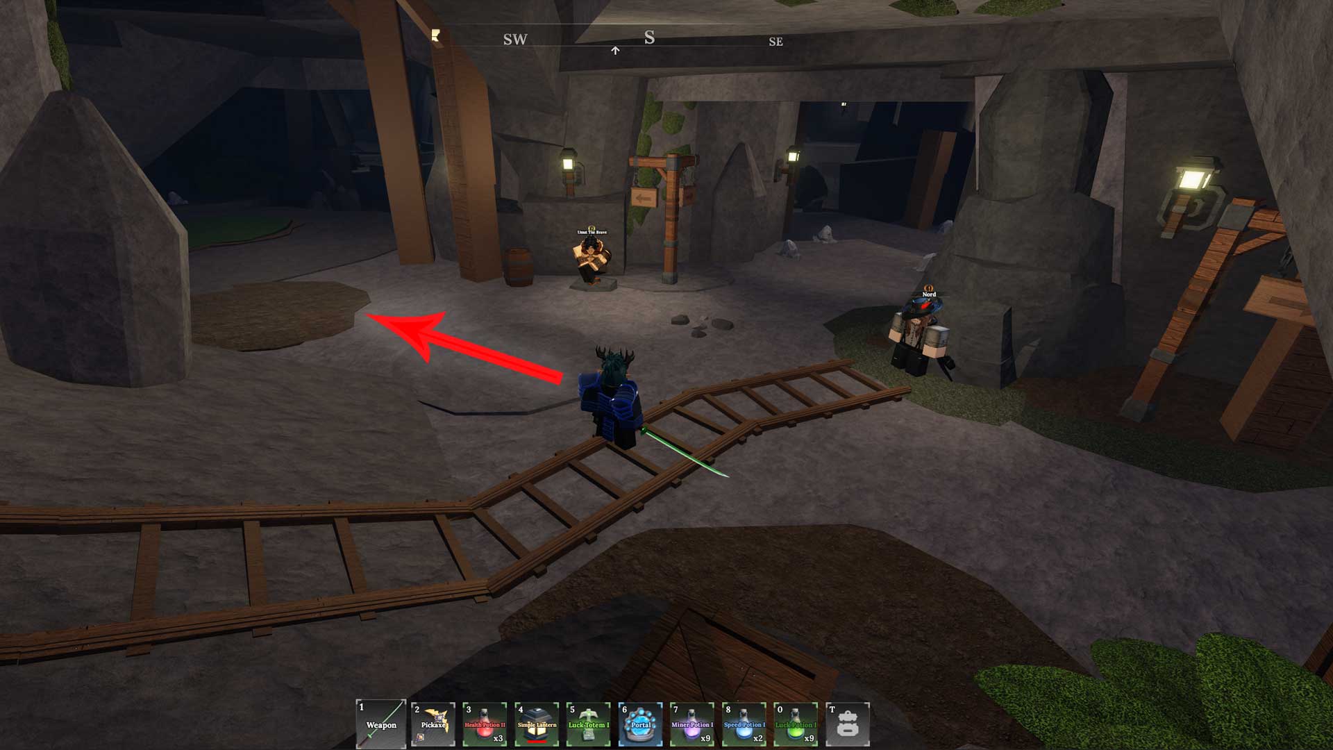 The Cave entrance in The Forge's first area with a red arrow pointed at a patch of dirt. 