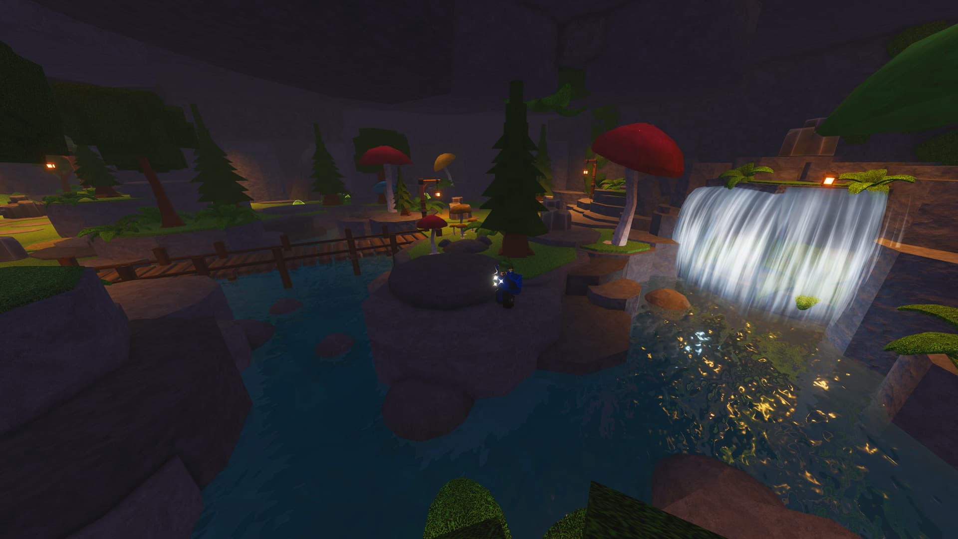 The Forge Goblin Cave with a zoomed out perspective. It's a colorful, grassy area with a waterfall in the far back across a bridge.