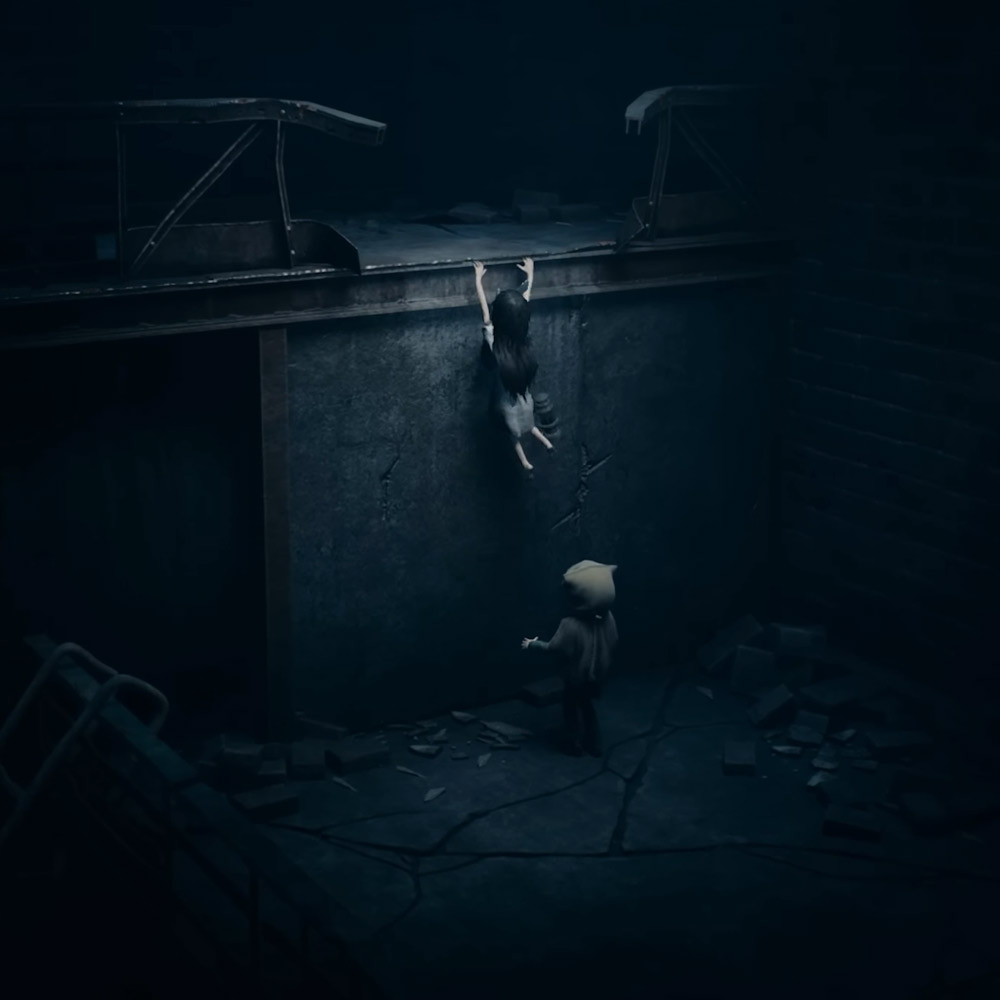 Reanimal protagonists helping each other get over a wall, one is hanging from the side