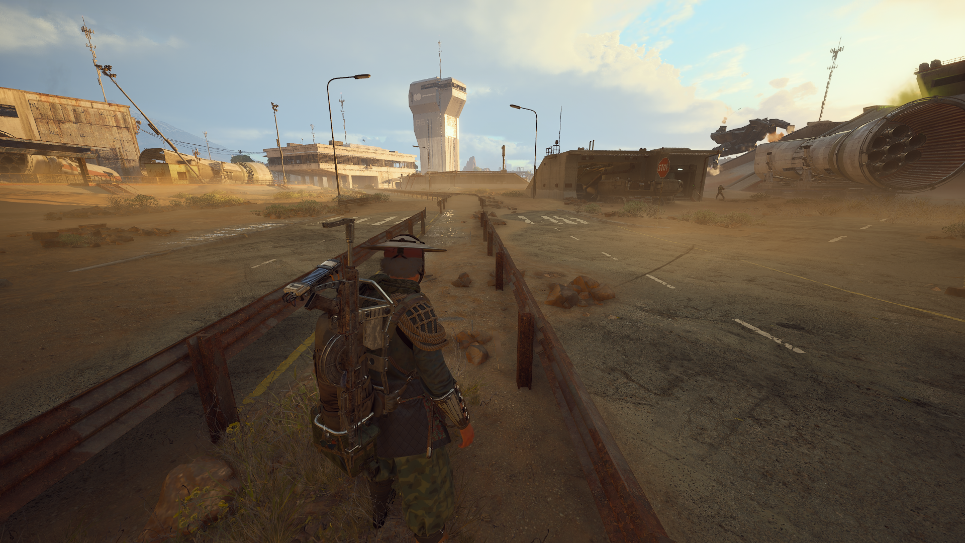 A dual carriageway in Arc Raiders, with a nearby nonsensical stop sign.