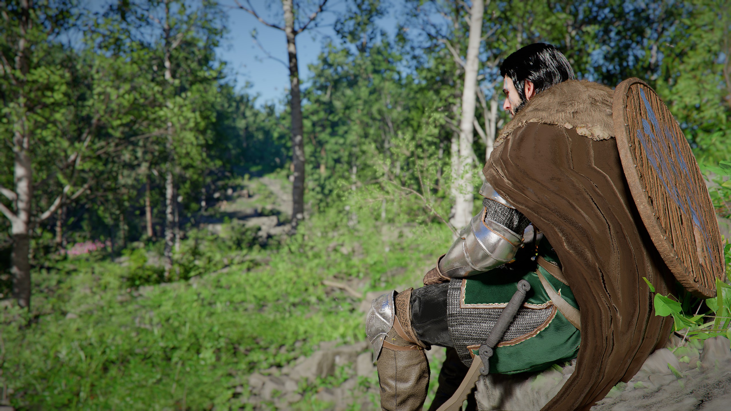 Kliff perches on top of a rock in a forest.