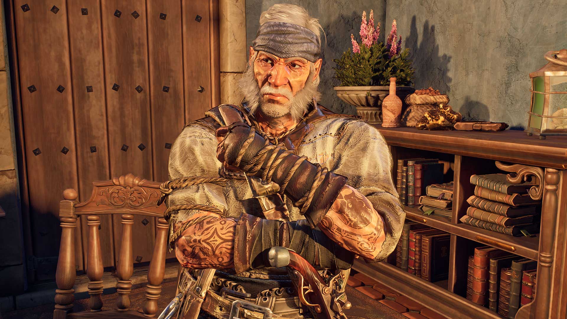 Windrose - The People of Tortuga leader, Charlie Sharpe. He's an older man with white hair and a mustache. He's got rope around his arms and wears a blue bandana.