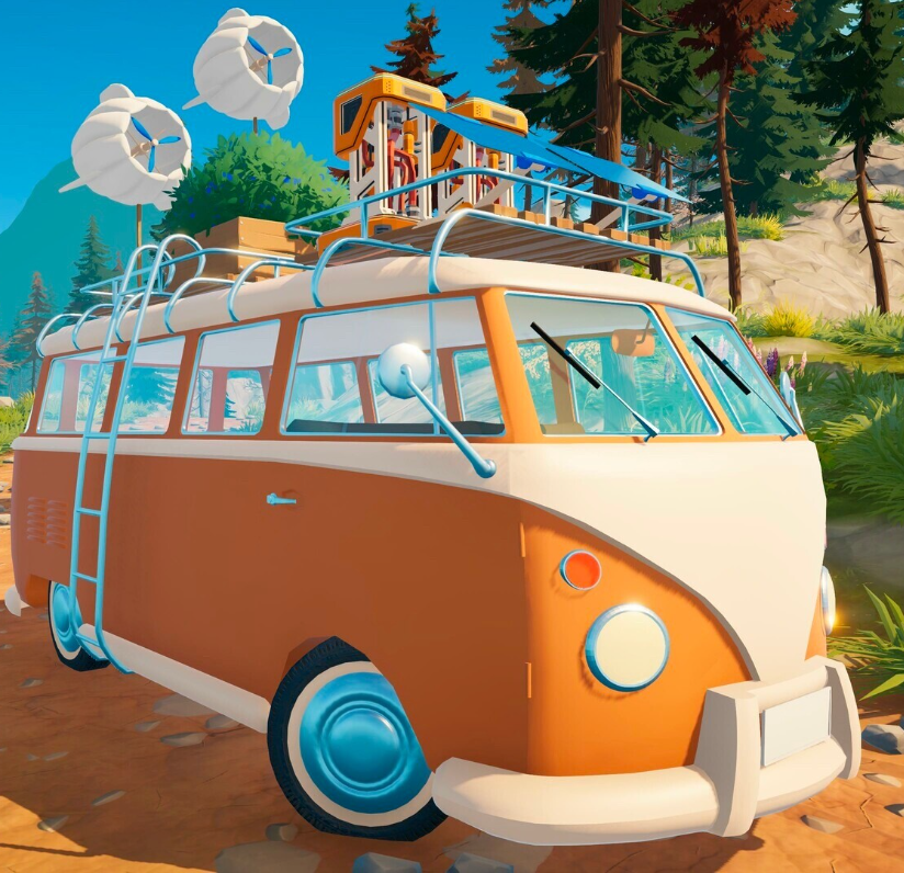 Outbound - An orange camper van with wind kites on the back