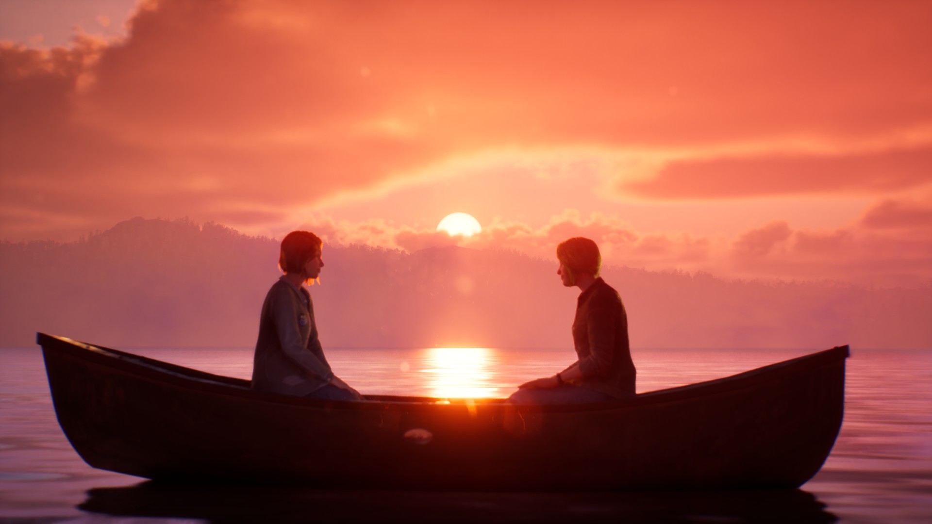 Max and Chloe on a boat on a lake.