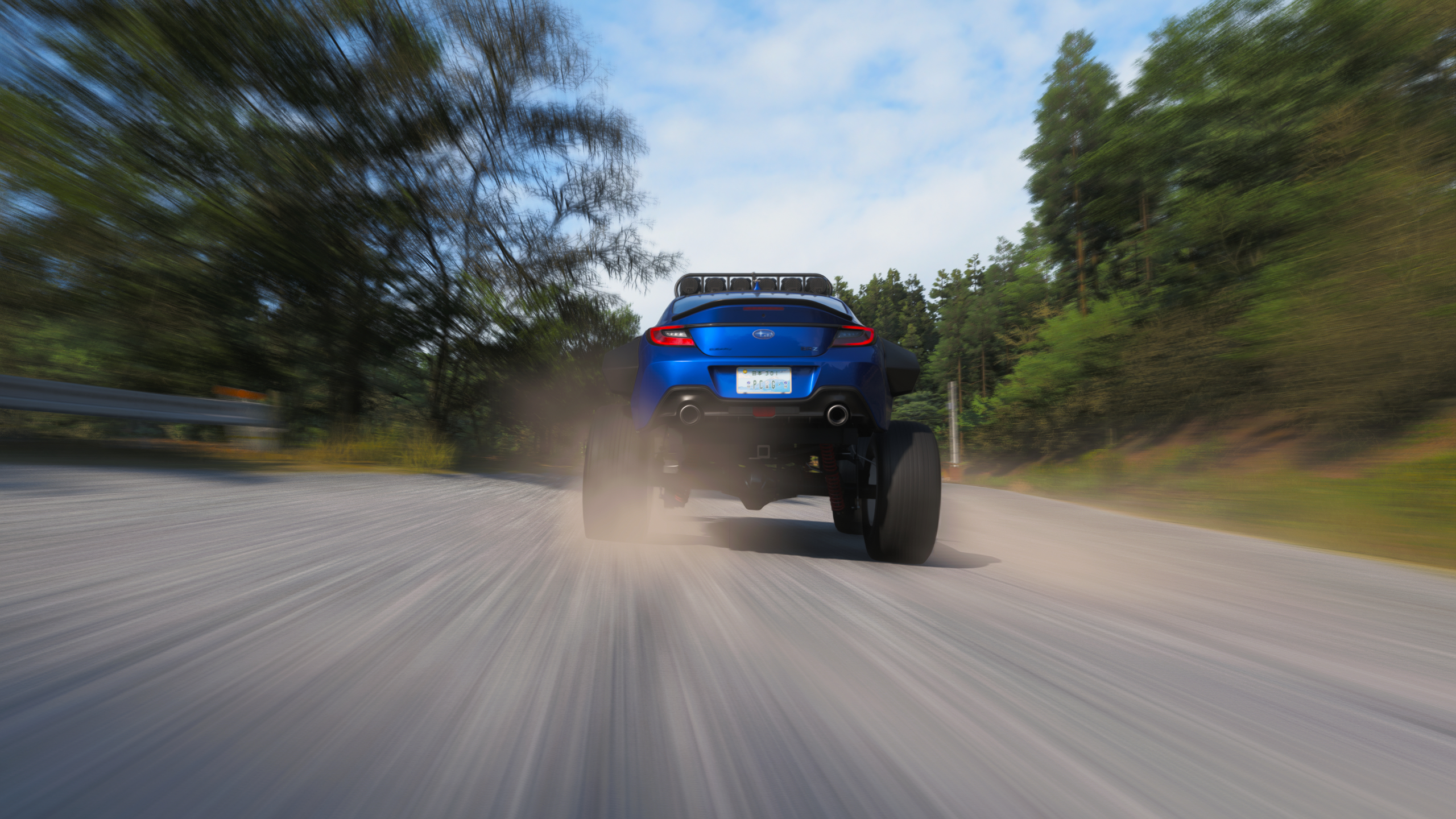 Forza Horizon 6 best cars: The 2022 Subaru BRZ Forza Edition kicking up dirt as it drives down a path.