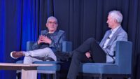 Amazon Leo's Rajeev Badyal and Chris Weber onstage during luncheon