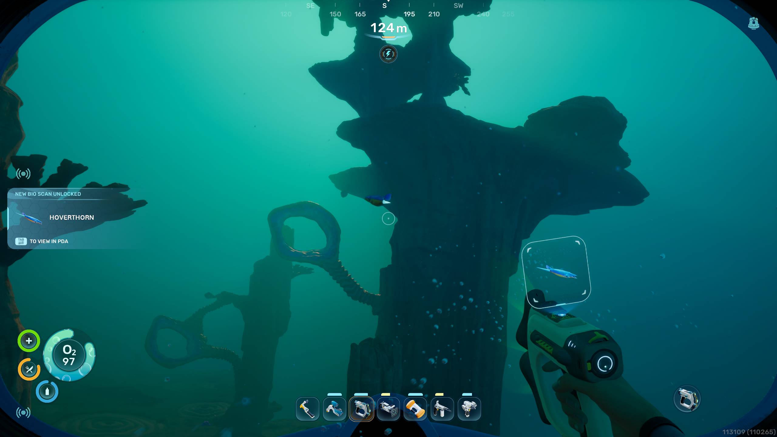 Subnautica 2 Biomods: A player looking at a Hoverthorn near an alien rock formation.