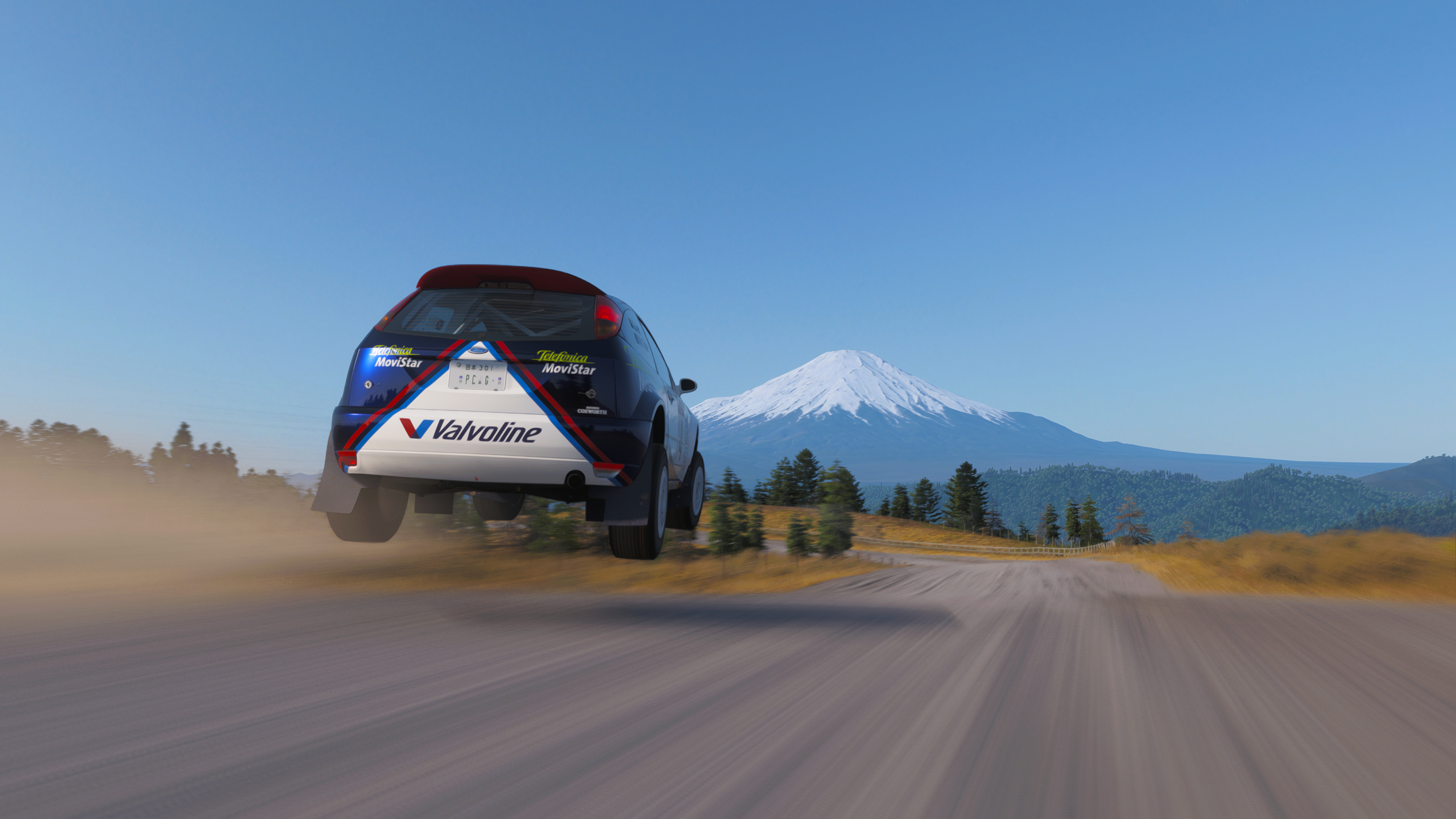 Forza Horizon 6 best cars: The 2001 Ford #4 Ford Focus RS jumping over a dirt hill.