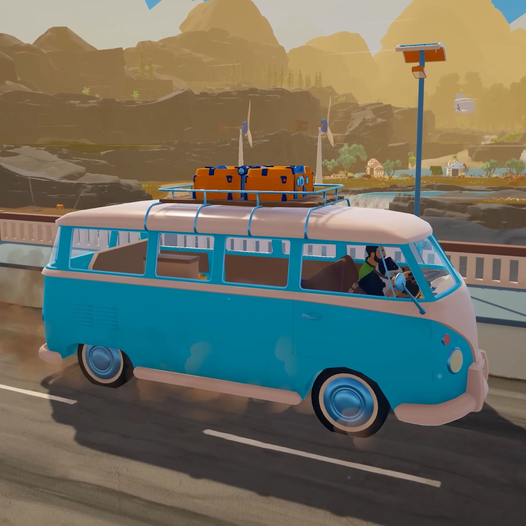 A blue camper van from Outbound with a car of players