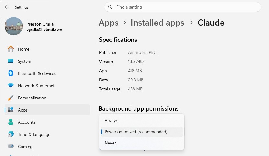 screenshot of settings > apps > installed apps > claude with background app permissions dropdown menu