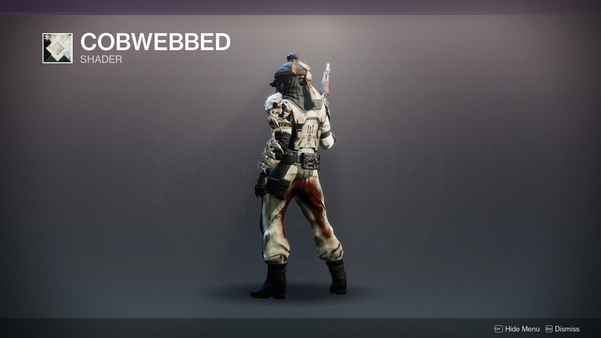 Destiny 2 screenshot showing how the combination of Cobwebbed shader and Scavenger Suit leg armor gives the Guardian an unfortunate poopy pants look.