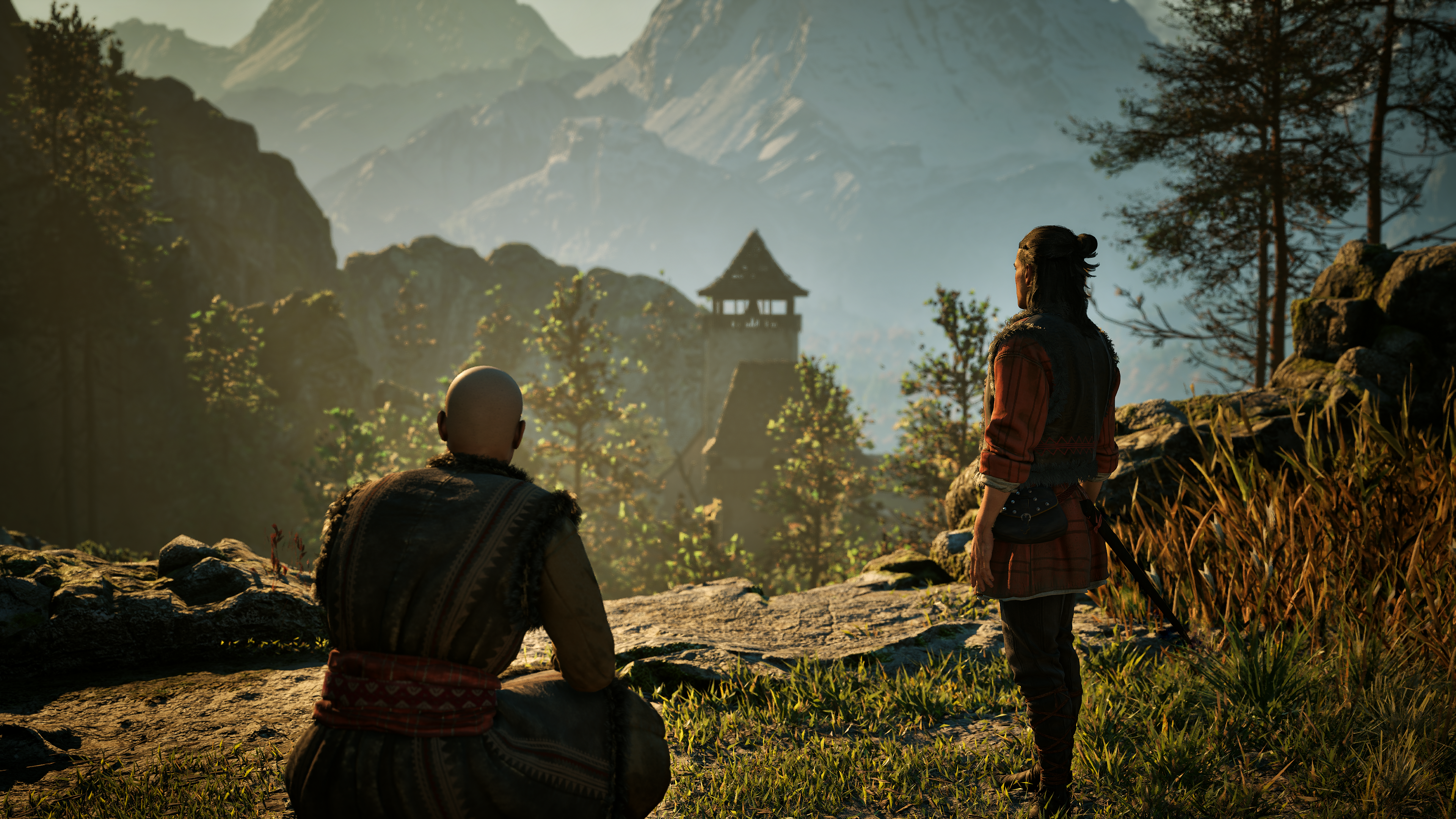 Coen and his father stand on a ridge in The Blood of Dawnwalker.