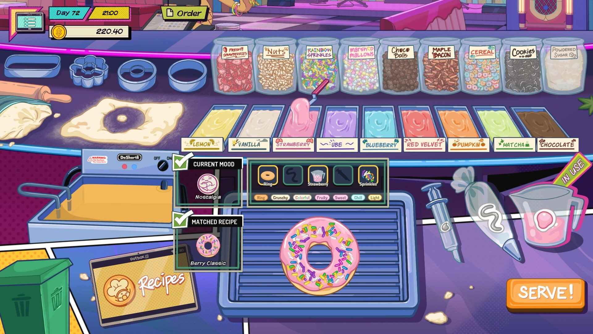 High Times - a pink frosted doughtnut with sprinkles on a counter full of toppings