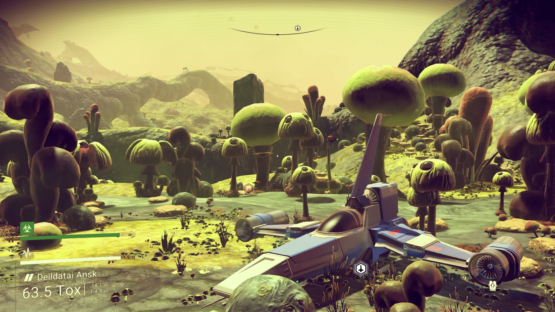 A 2016 No Man's Sky screenshot showing a small spaceship on a yellow alien planet.