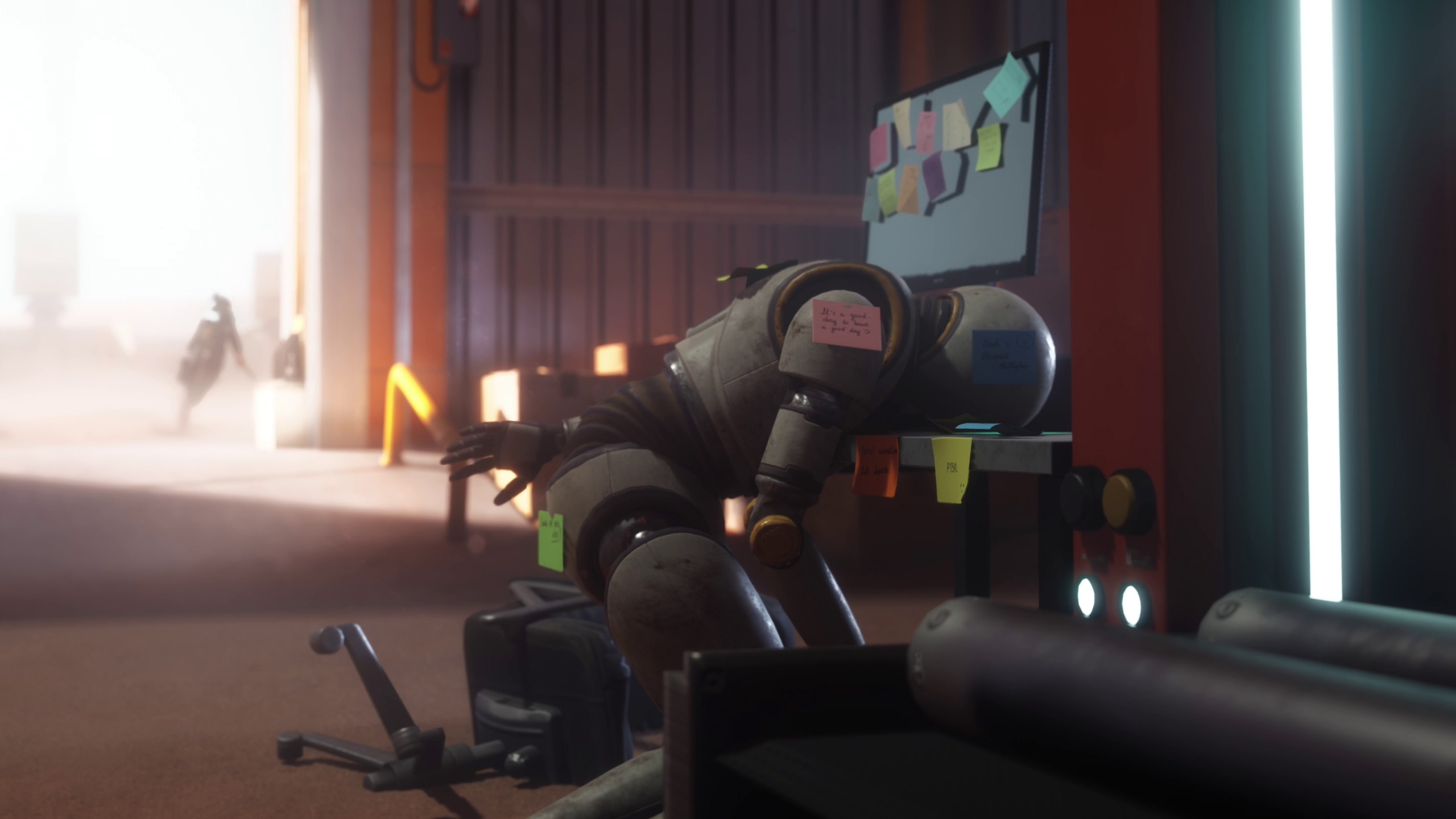 Robot slumped over desk